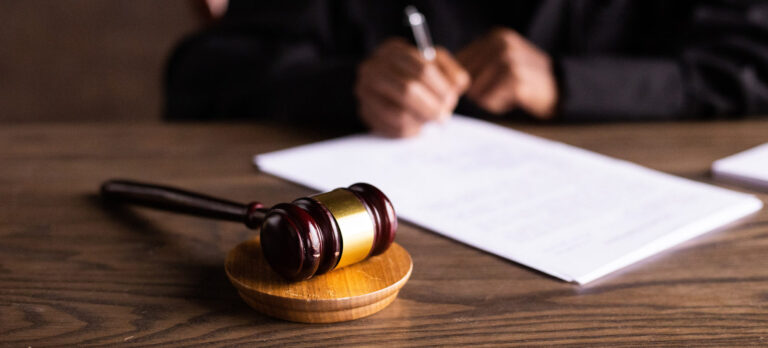 judge signing paperwork