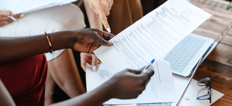 people looking over paperwork