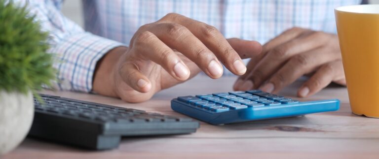 person using calculator