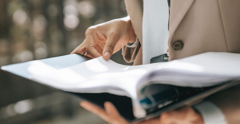 person looking over documents