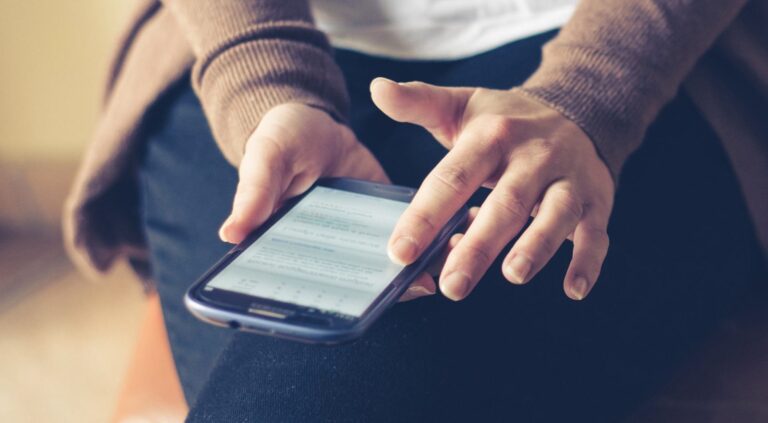 person holding cell phone