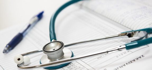 stethoscope on top of document