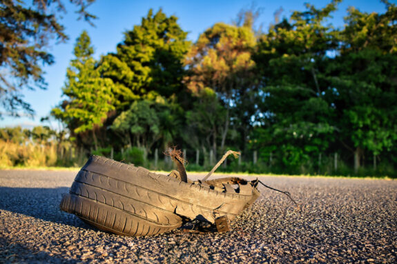 blown out tire on roadway